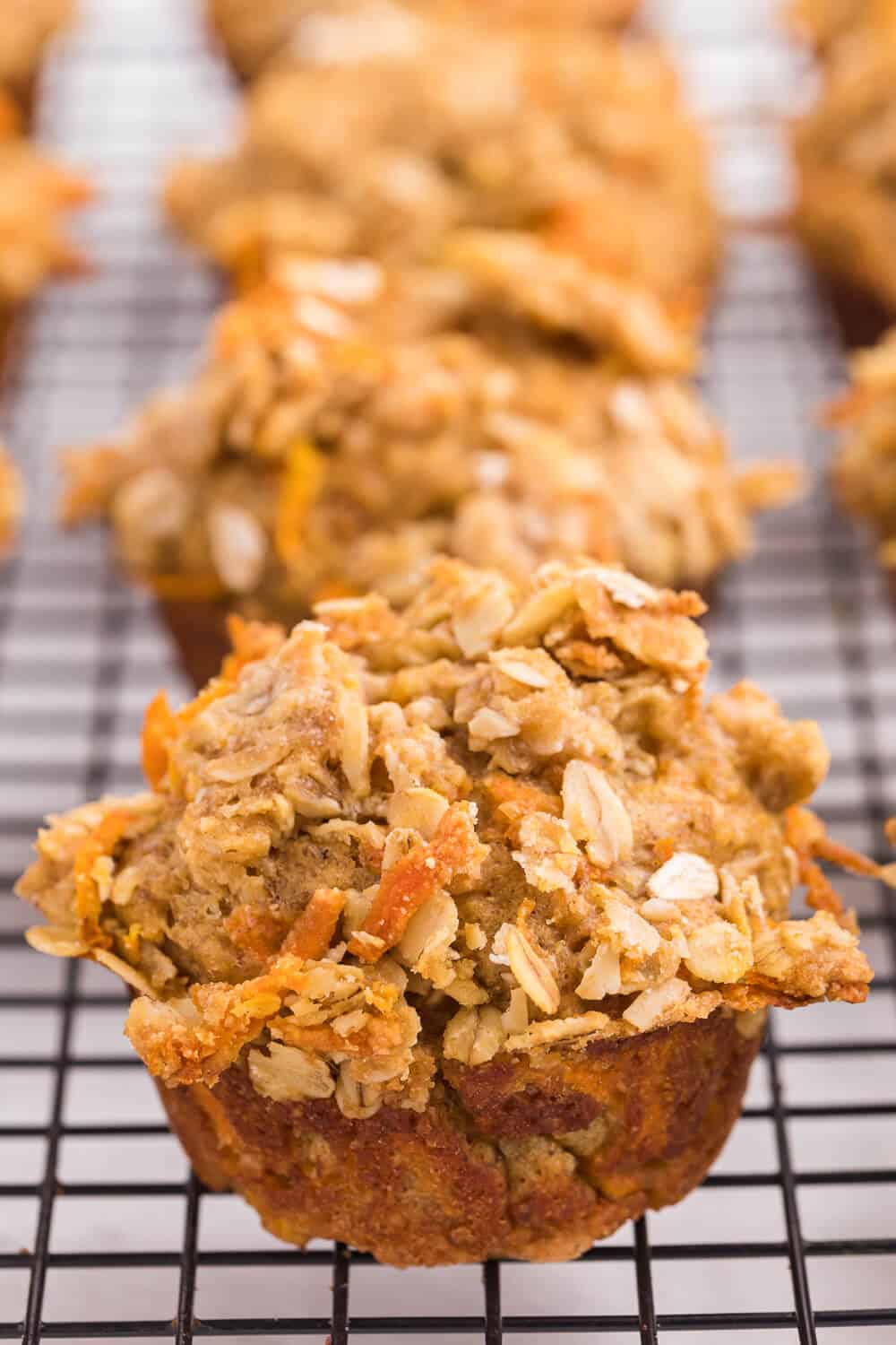 Double Orange Muffins - Packed full of goodness with carrots, orange juice, oat bran, flax seed, Greek yogurt and more. Make the night before to save time in the morning. Healthy and delicious!