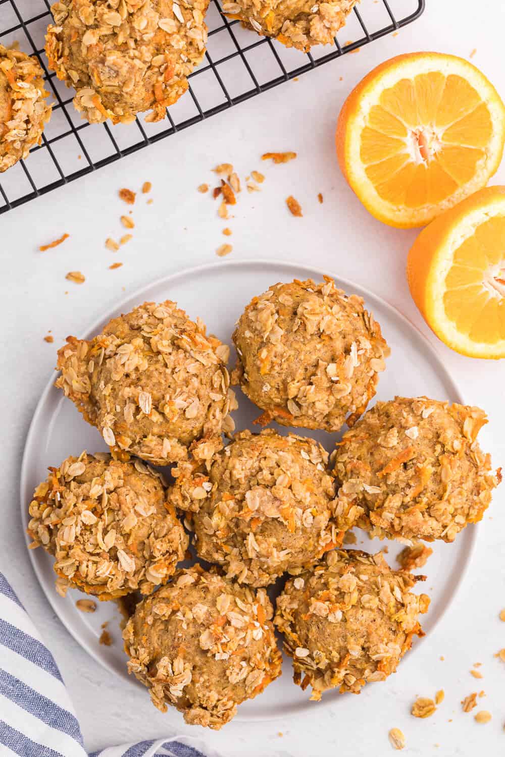 Double Orange Muffins - Packed full of goodness with carrots, orange juice, oat bran, flax seed, Greek yogurt and more. Make the night before to save time in the morning. Healthy and delicious!