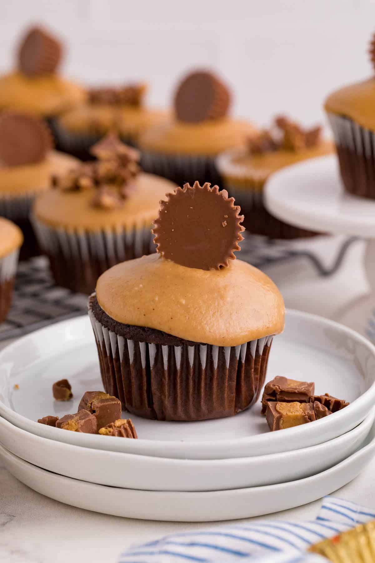 A Reese's Cupcake on a white plate.