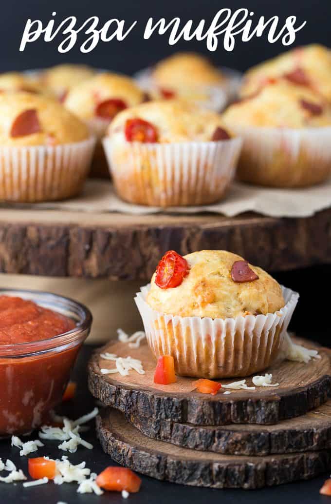 Pizza Muffins - This kid friendly snack tastes and smells like pizza, but in a muffin form. Add in your fave toppings to change it up!