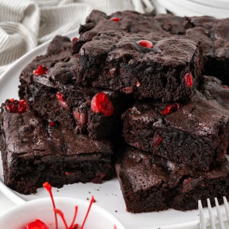 A plate of cherry chocolate brownies.