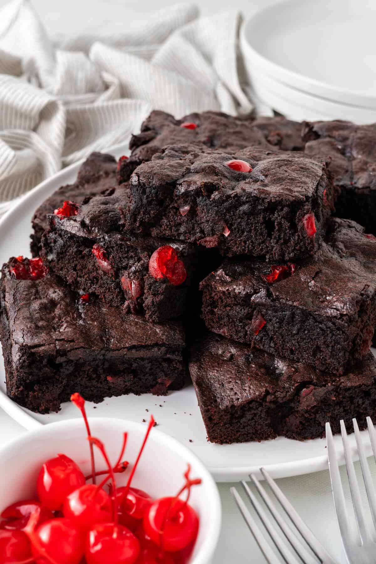A plate of cherry chocolate brownies.