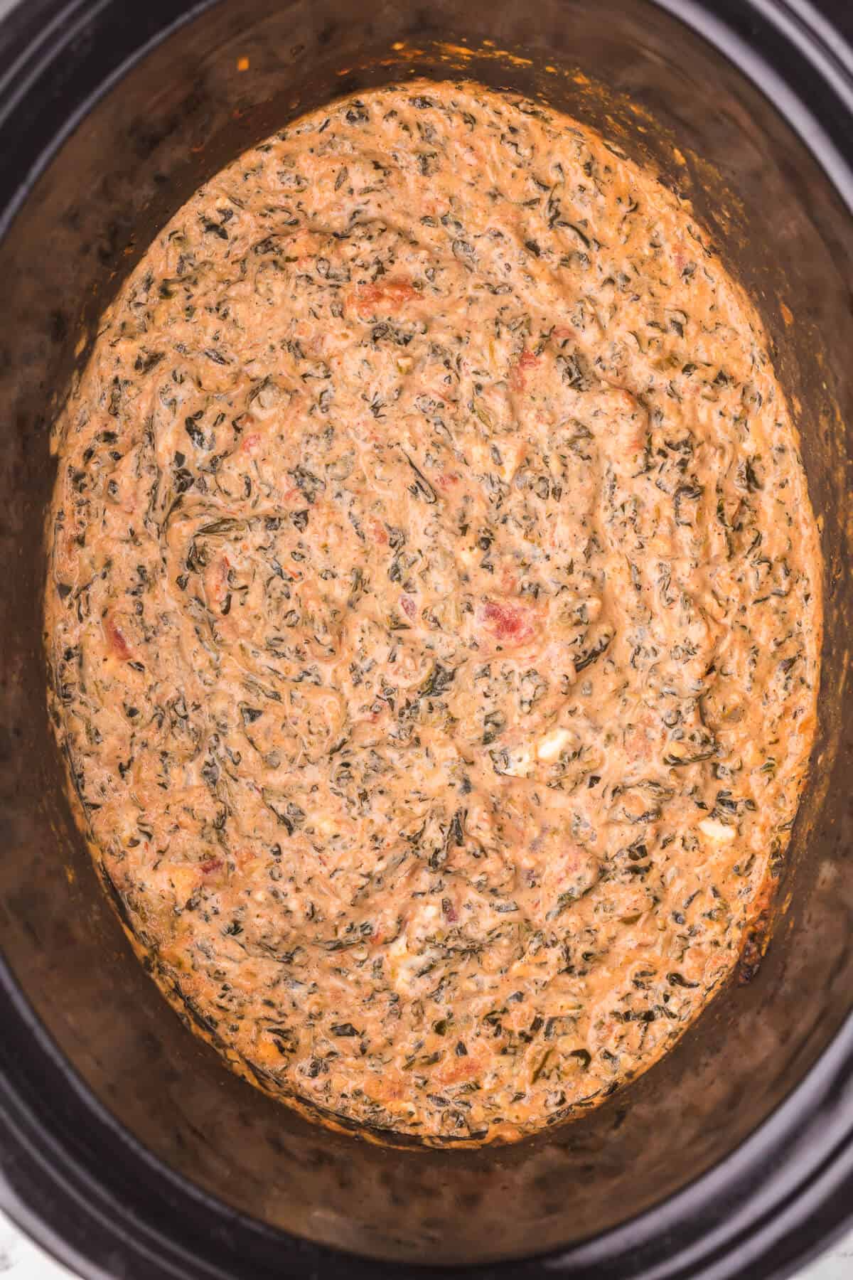 Tex-Mex Spinach Dip - Add a new kick to your classic spinach dip recipe! This appetizer is super creamy with just 5 ingredients. Just dump, heat, and serve.