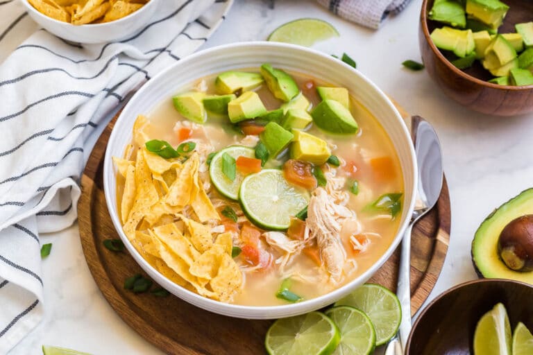 Chicken lime soup in a bowl.