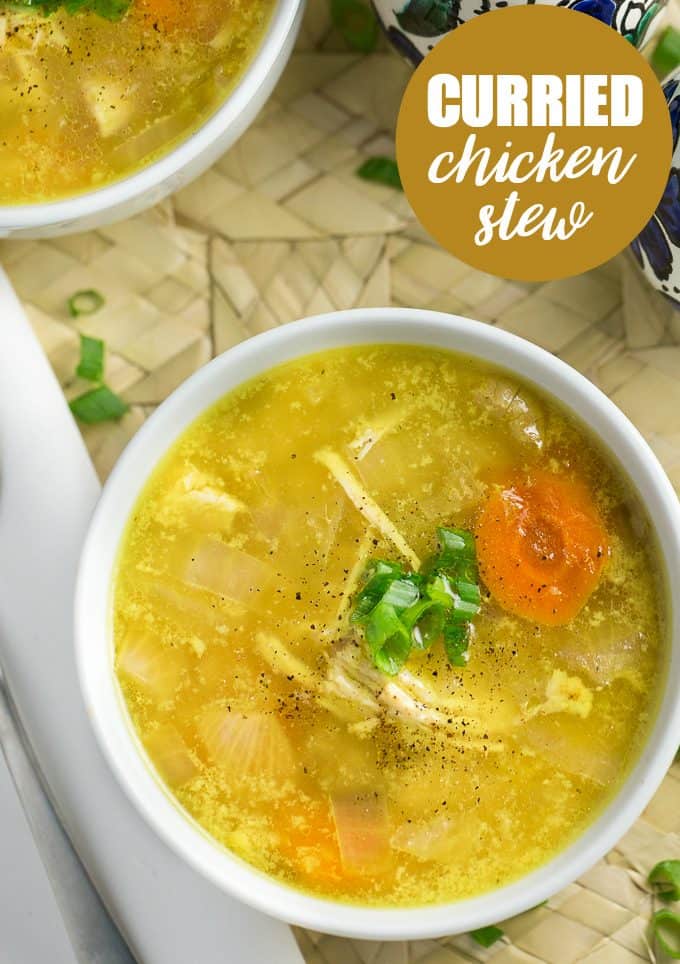 Curried Chicken Stew - Comforting and delicious! This easy crockpot stew recipe is made with tender chicken, coconut milk, curry powder, and fresh ginger.