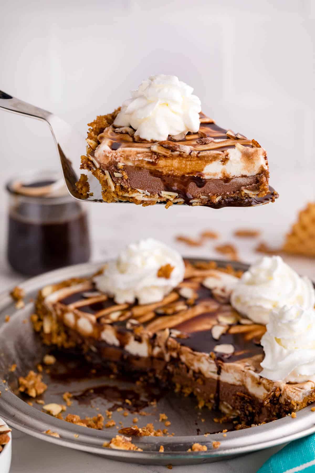 Ice cream pie slice on a pie server.