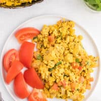 Indian Scrambled Eggs - Bring Indian seasonings to the breakfast table! This quick morning staple is packed with cumin, onion, green chiles, tomatoes, turmeric, and cilantro.
