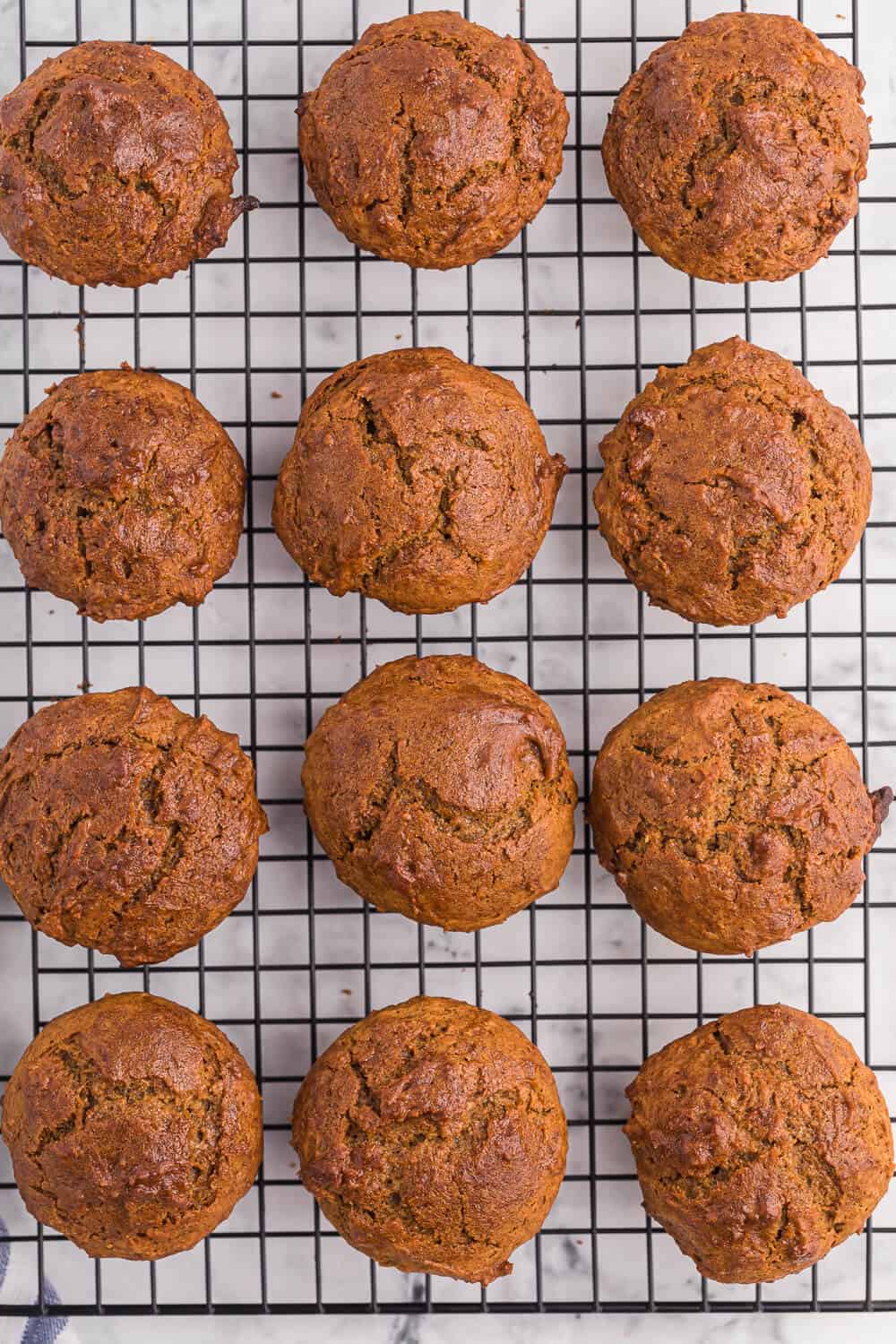 sweet potato muffins on a cooling rack