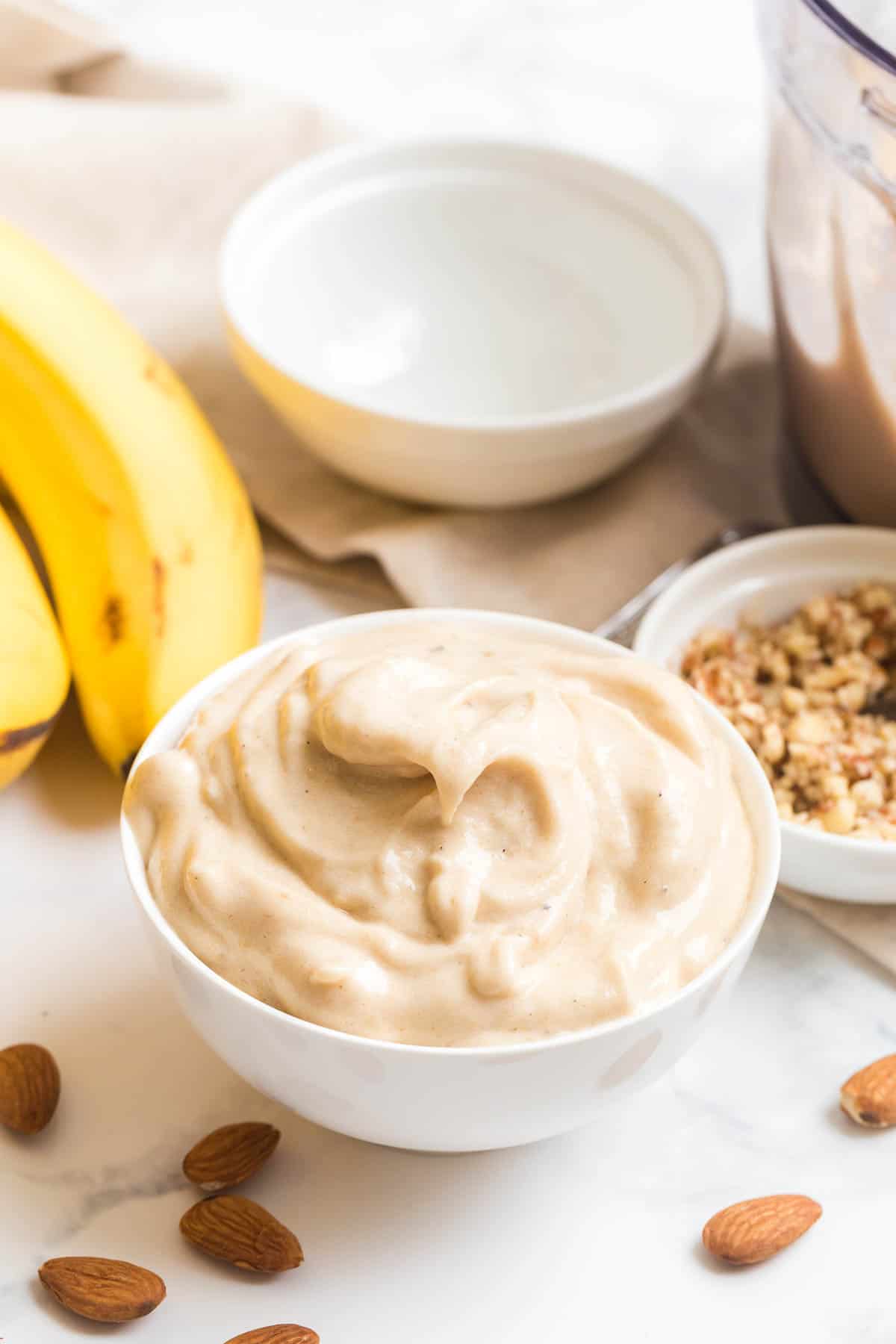 Dairy free banana ice cream in a white bowl.