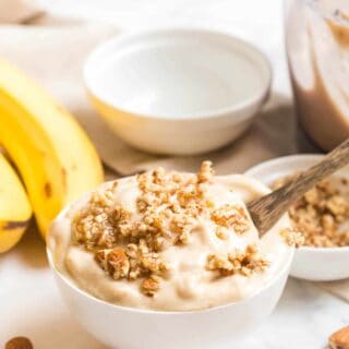 Dairy Free Banana Ice Cream in a bowl with a spoon.