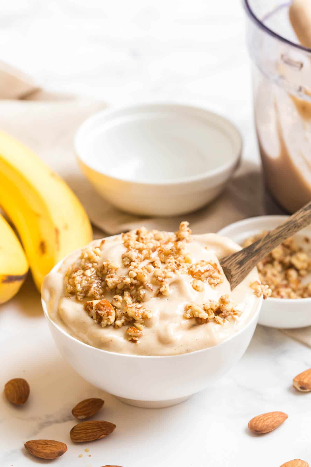 Dairy Free Banana Ice Cream in a bowl with a spoon.