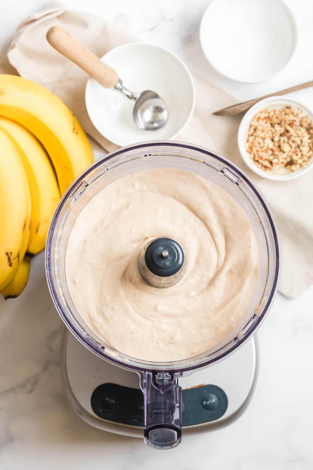 Dairy free banana ice cream in a blender.