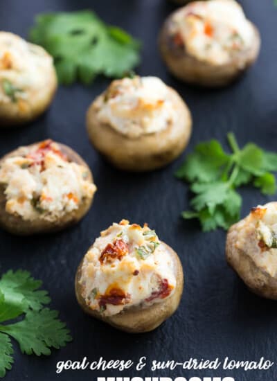 Goat Cheese & Sun-Dried Tomato Mushrooms - Stuffed with a creamy filling. An amazing appetizer!