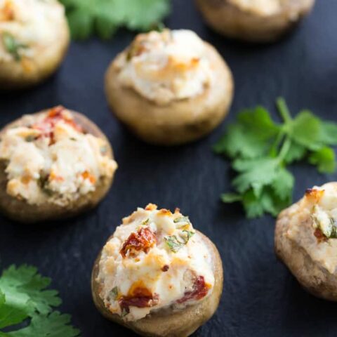 Goat Cheese & Sun-Dried Tomato Mushrooms - Stuffed with a creamy filling. An amazing appetizer!