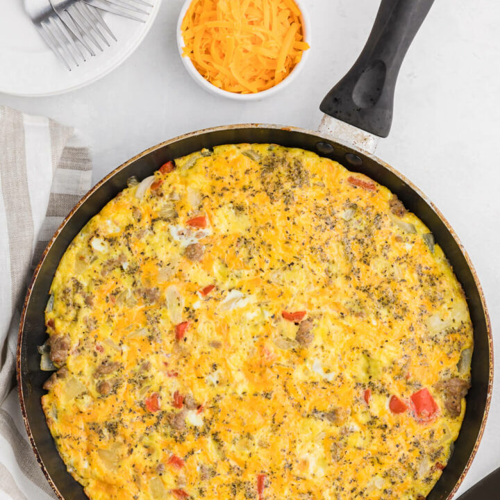 Sausage & Red Pepper Frittata - Sweet red peppers and savoury sausage are a delight together in this easy and delicious recipe. Served with a salad and fresh bread, it's the perfect quick weeknight meal!