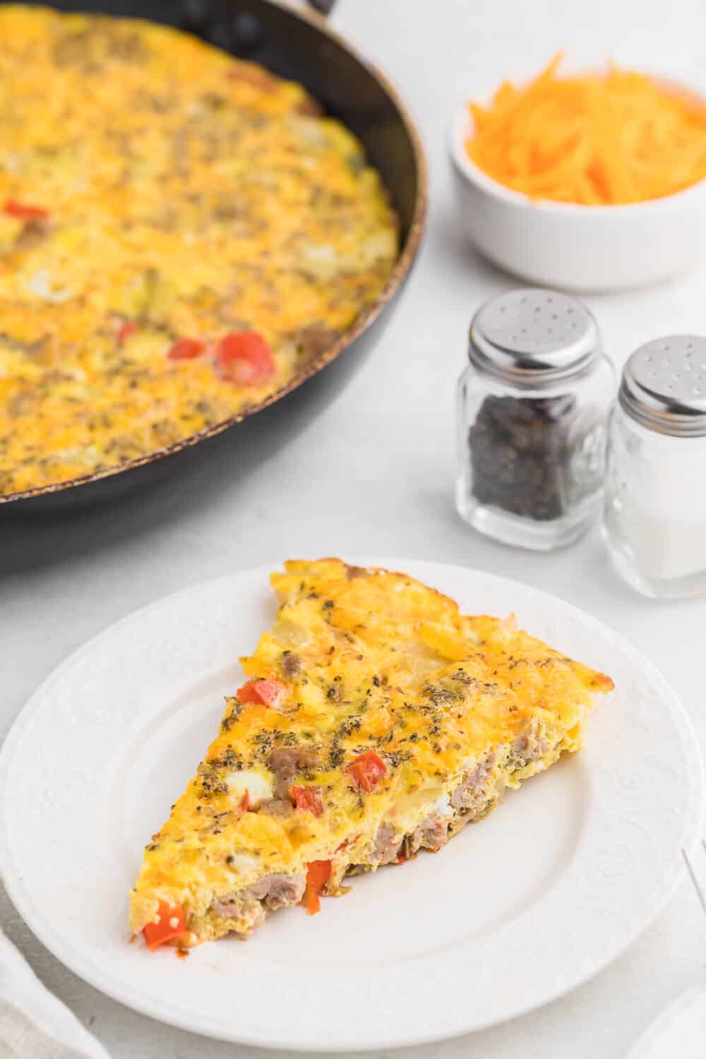 Sausage & Red Pepper Frittata - Sweet red peppers and savoury sausage are a delight together in this easy and delicious recipe. Served with a salad and fresh bread, it's the perfect quick weeknight meal!