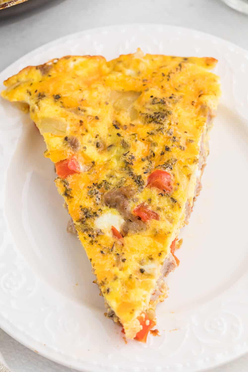 Sausage & Red Pepper Frittata - Sweet red peppers and savoury sausage are a delight together in this easy and delicious recipe. Served with a salad and fresh bread, it's the perfect quick weeknight meal!