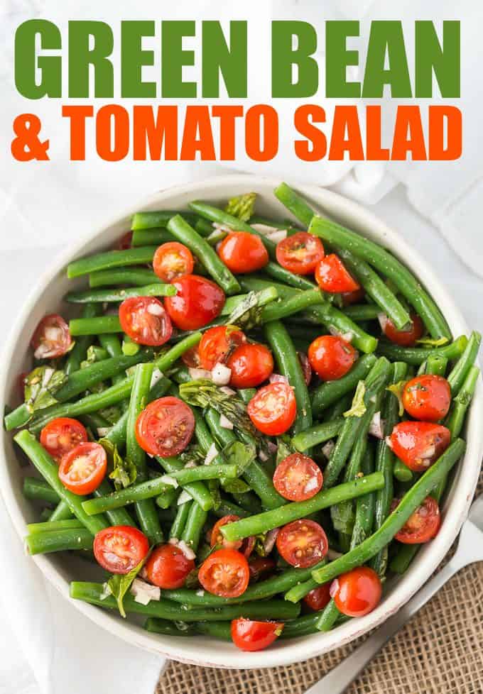 Green Bean and Tomato Salad - An effortless side dish that screams summer! This light and crispy side dish is great for weeknight dinners or your next barbecue.