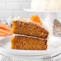 A slice of carrot cake on a plate.