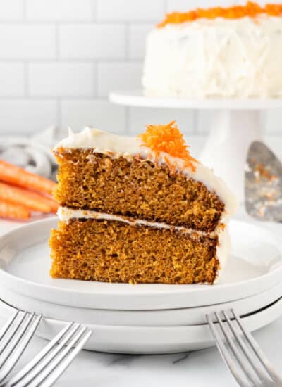 A slice of carrot cake on a plate.