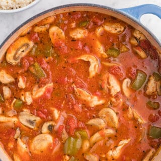 One-Pot Chicken Cacciatore - This is a delicious pantry staple casserole. Made with common ingredients like chicken, green peppers, mushrooms, onions and canned tomatoes, you can throw the ingredients in just one pot - quick to make and quick to clean up!