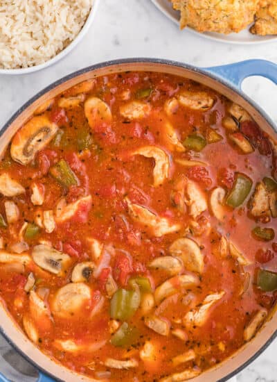 One-Pot Chicken Cacciatore - This is a delicious pantry staple casserole. Made with common ingredients like chicken, green peppers, mushrooms, onions and canned tomatoes, you can throw the ingredients in just one pot - quick to make and quick to clean up!