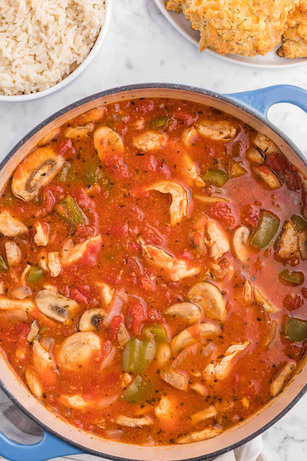 One-Pot Chicken Cacciatore - This is a delicious pantry staple casserole. Made with common ingredients like chicken, green peppers, mushrooms, onions and canned tomatoes, you can throw the ingredients in just one pot - quick to make and quick to clean up!