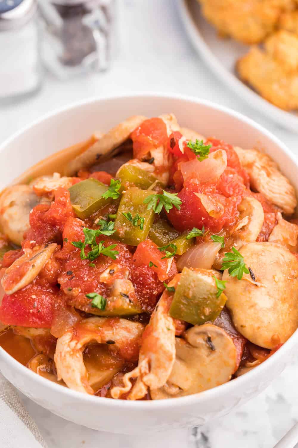 One-Pot Chicken Cacciatore - This is a delicious pantry staple casserole. Made with common ingredients like chicken, green peppers, mushrooms, onions and canned tomatoes, you can throw the ingredients in just one pot - quick to make and quick to clean up!