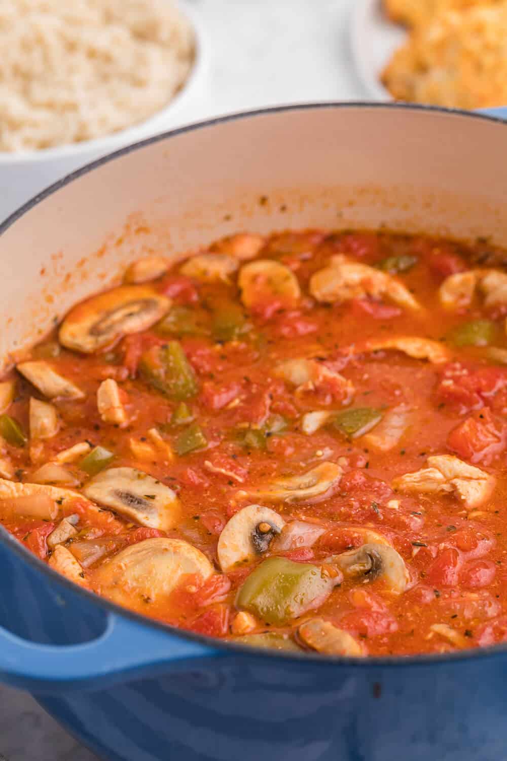 One-Pot Chicken Cacciatore - This is a delicious pantry staple casserole. Made with common ingredients like chicken, green peppers, mushrooms, onions and canned tomatoes, you can throw the ingredients in just one pot - quick to make and quick to clean up!