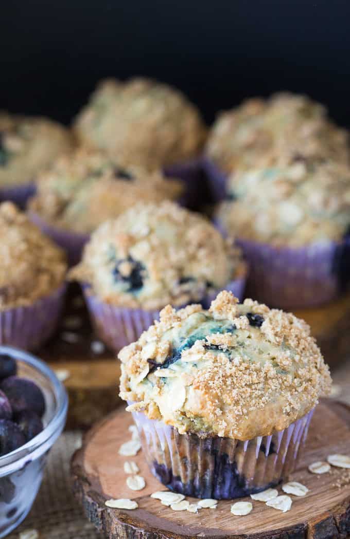 Blueberry Streusel Muffins - Cinnamon sugar topping sets these blueberry muffins apart! Packed with sweet blueberries and topped with a crunchy oat topping, these muffins are delicious fresh out of the oven with a little butter.