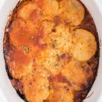 Cowboy Chicken Chili Casserole - Layers of chili, beans and potatoes for a hearty meal made in the slow cooker!