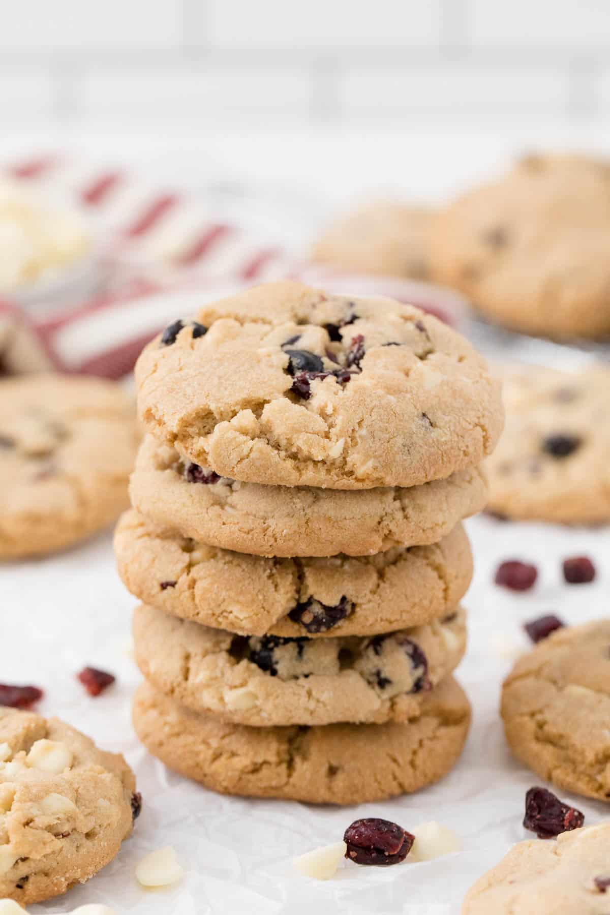 a stack of white chocolate chunk cranberry cookies