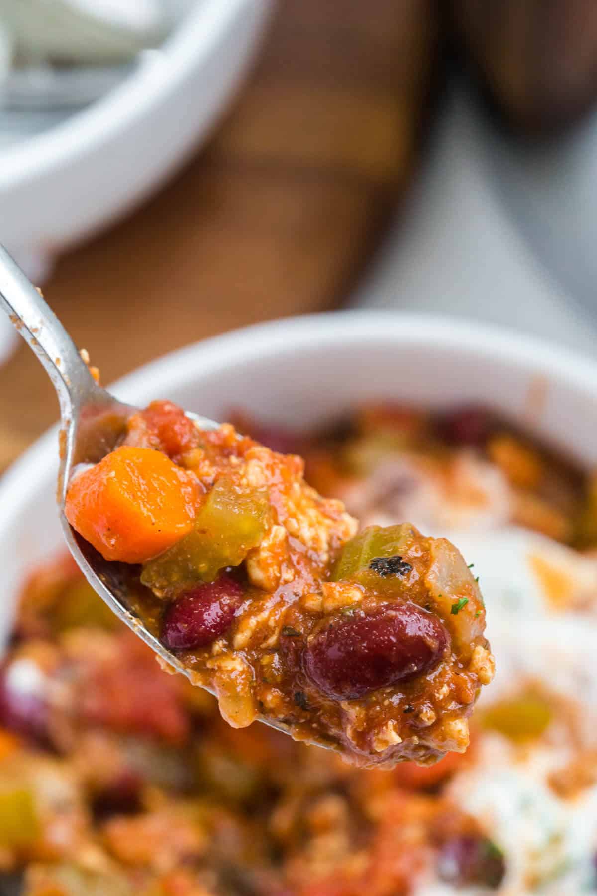 Chicken chili on a spoon.