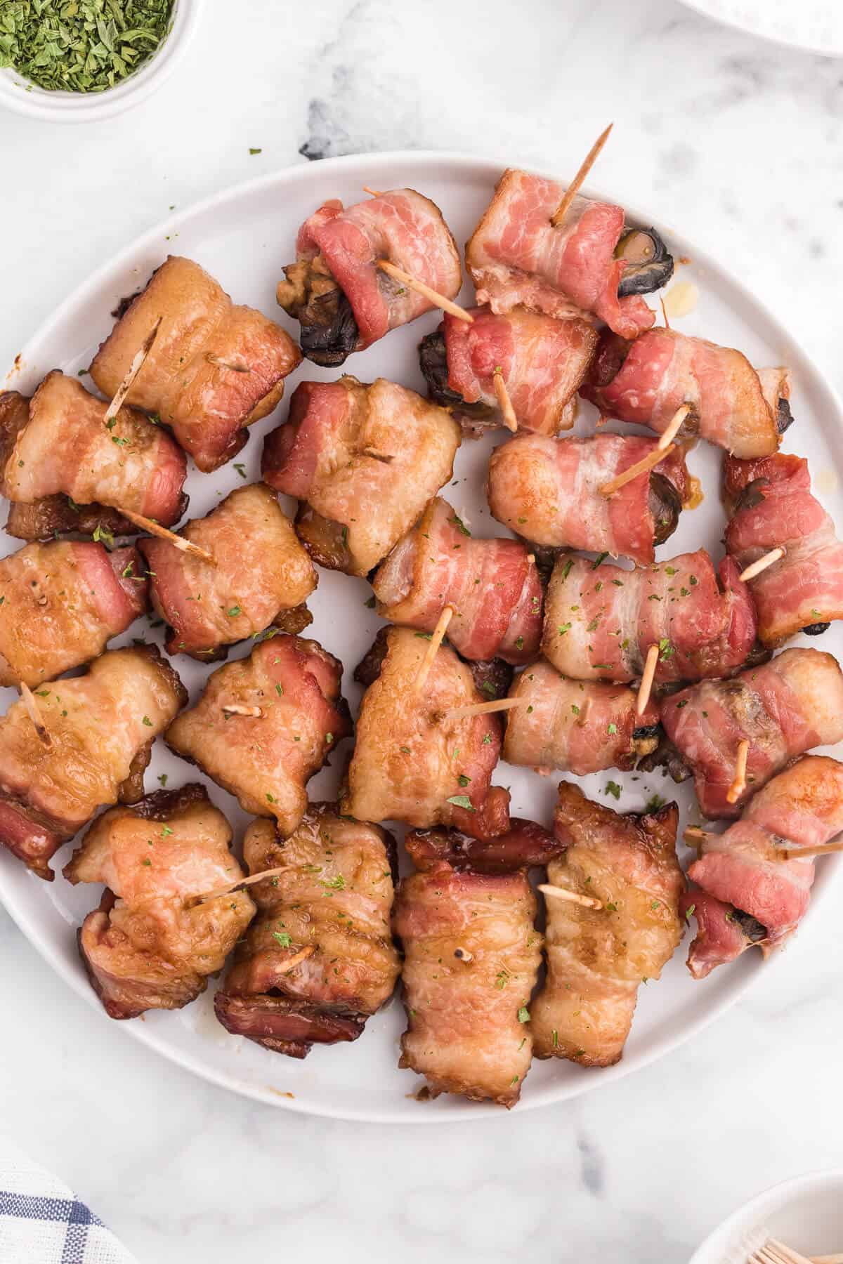 overhead of a plate of bacon wrapped appetizers