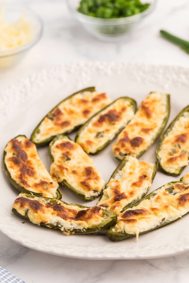 Cheese Stuffed Jalapenos - The best vegetarian appetizer to feed a crowd! Just 5 ingredients for this perfect party recipe.