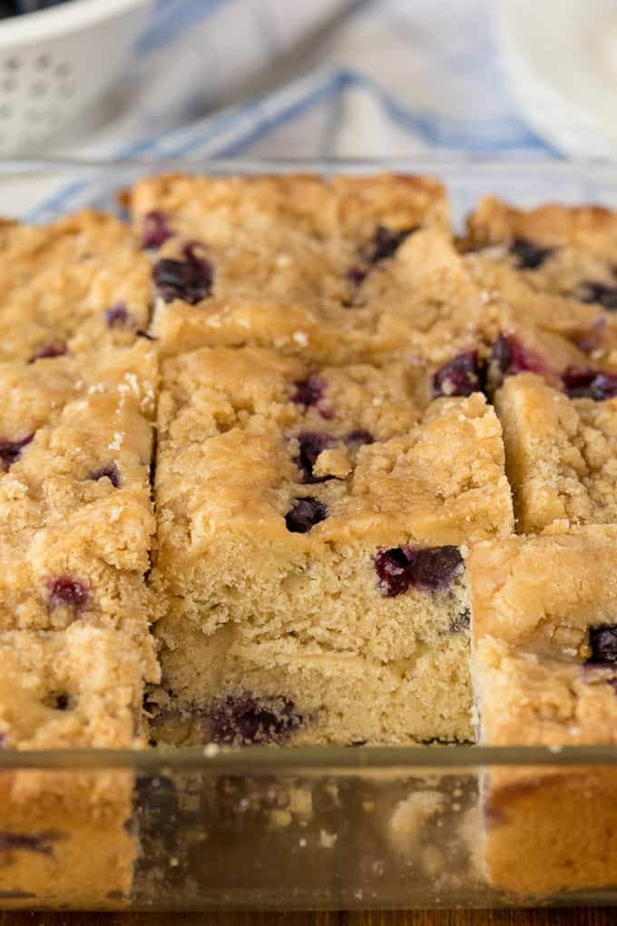 Pieces of blueberry buckle in a pan.