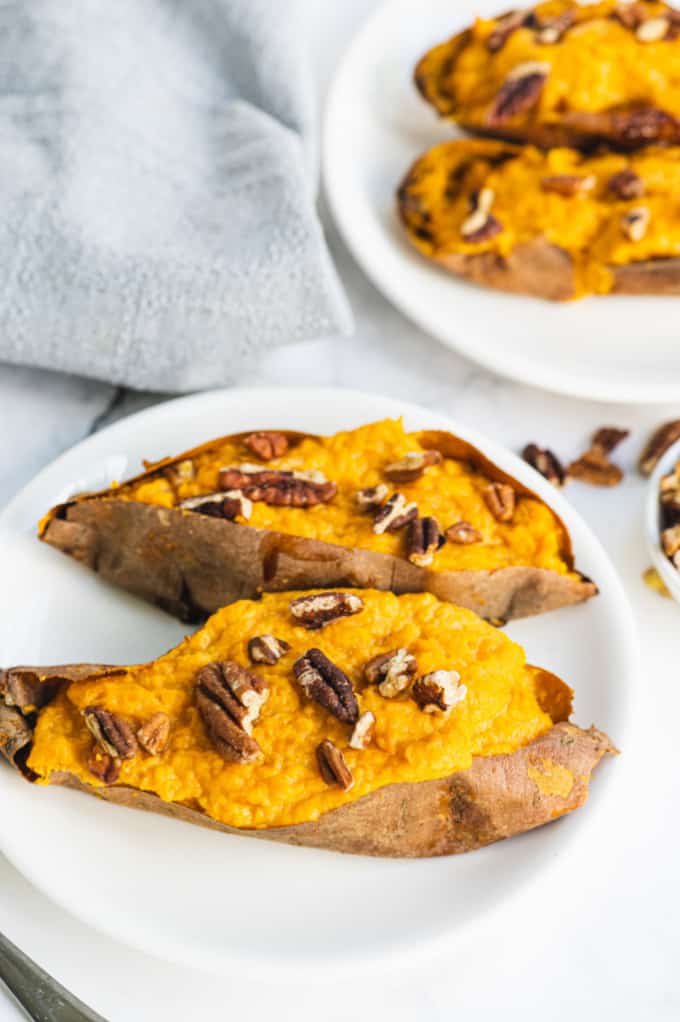 Twice Baked Sweet Potatoes - Creamy and rich made with maple syrup and cream cheese. Sweet and savory sweet potatoes are as decadent as the famous casserole, but easy enough for a weeknight dinner.