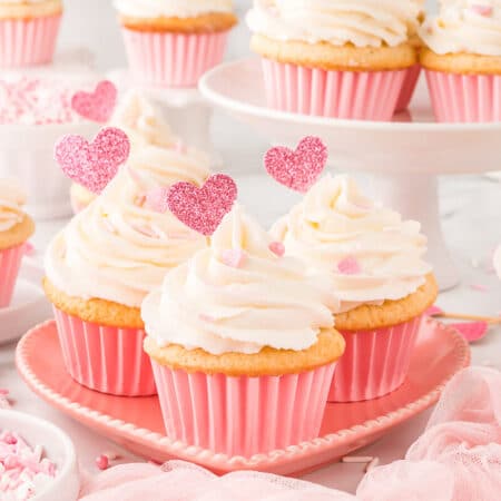 Valentine's day cupcakes on a heart plate.