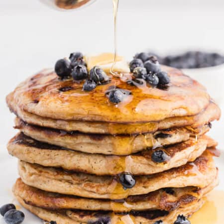 Whole Wheat Blueberry Pancakes - Blueberries are a wonder food, packed with fibre and antioxidants. Mixed into a light and fluffy whole wheat batter, these are a great way to add some extra nutrition without sacrificing delicious flavour.