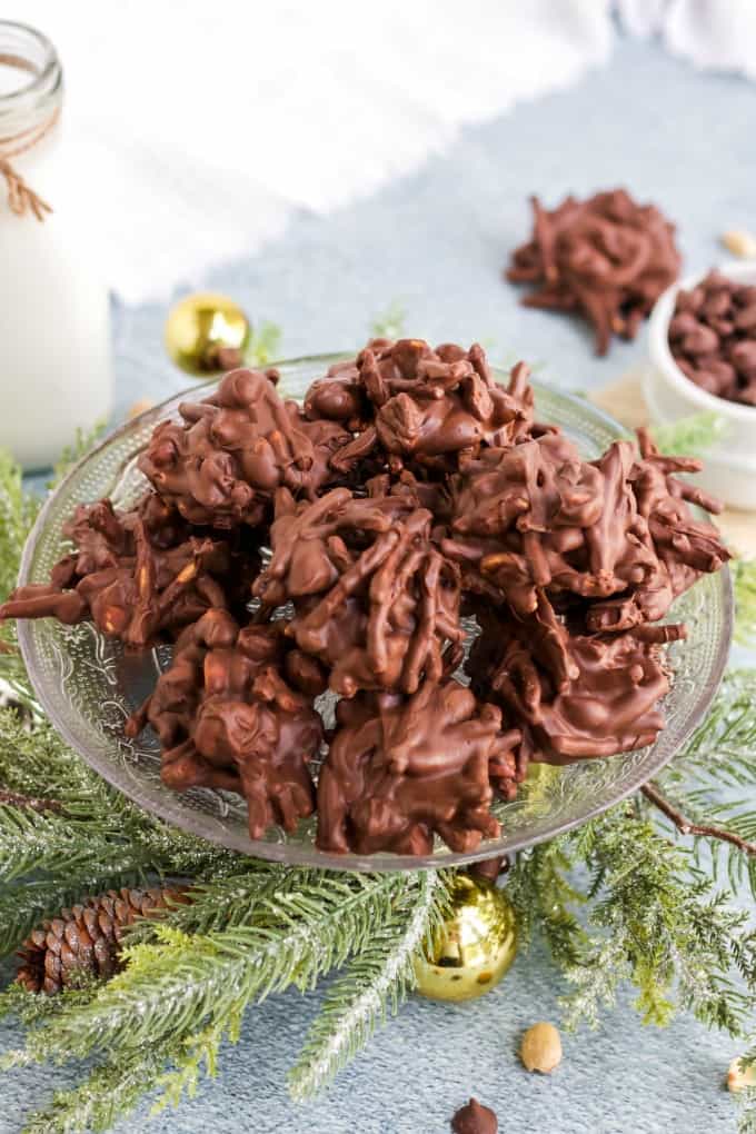 No-Bake Chocolate Peanut Butter Haystacks - This quick and easy four ingredient recipe is the perfect beginner recipe. Keep the kids busy in the kitchen making these crunchy, peanut buttery and chocolately classics!