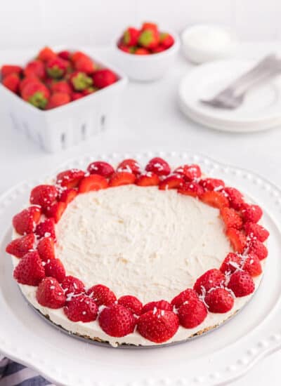 A whole no-bake strawberry cheesecake