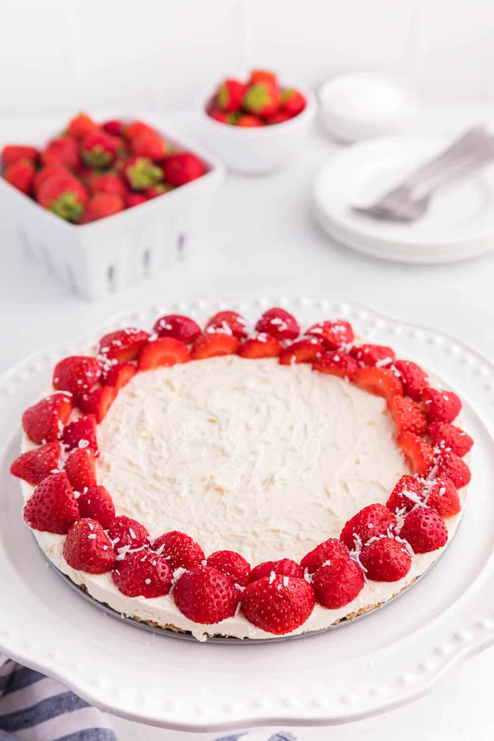 A whole no-bake strawberry cheesecake