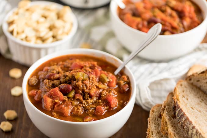 Presidential Chili - The best hearty chili recipe made with a secret ingredient! Warm up with a bowl of meaty comfort food packed with ground beef and seasoned kidney beans.