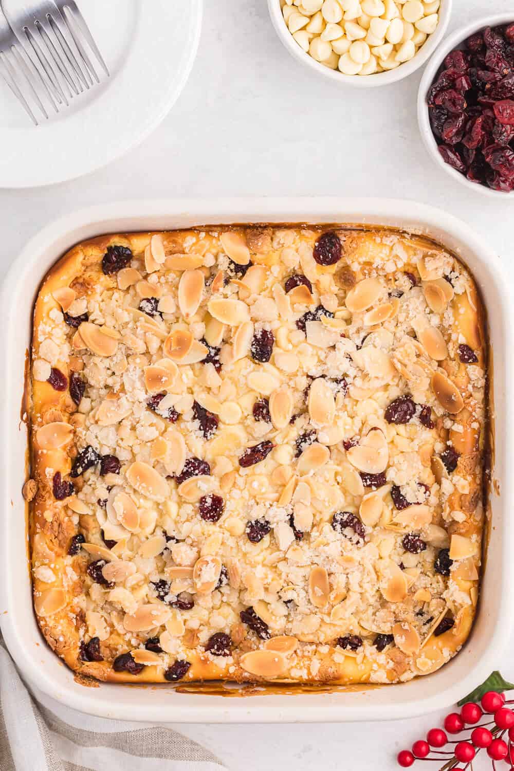 A pan of white chocolate cranberry cheesecake bars