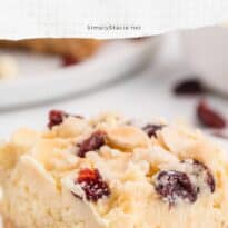 white chocolate cranberry cheesecake bars pin