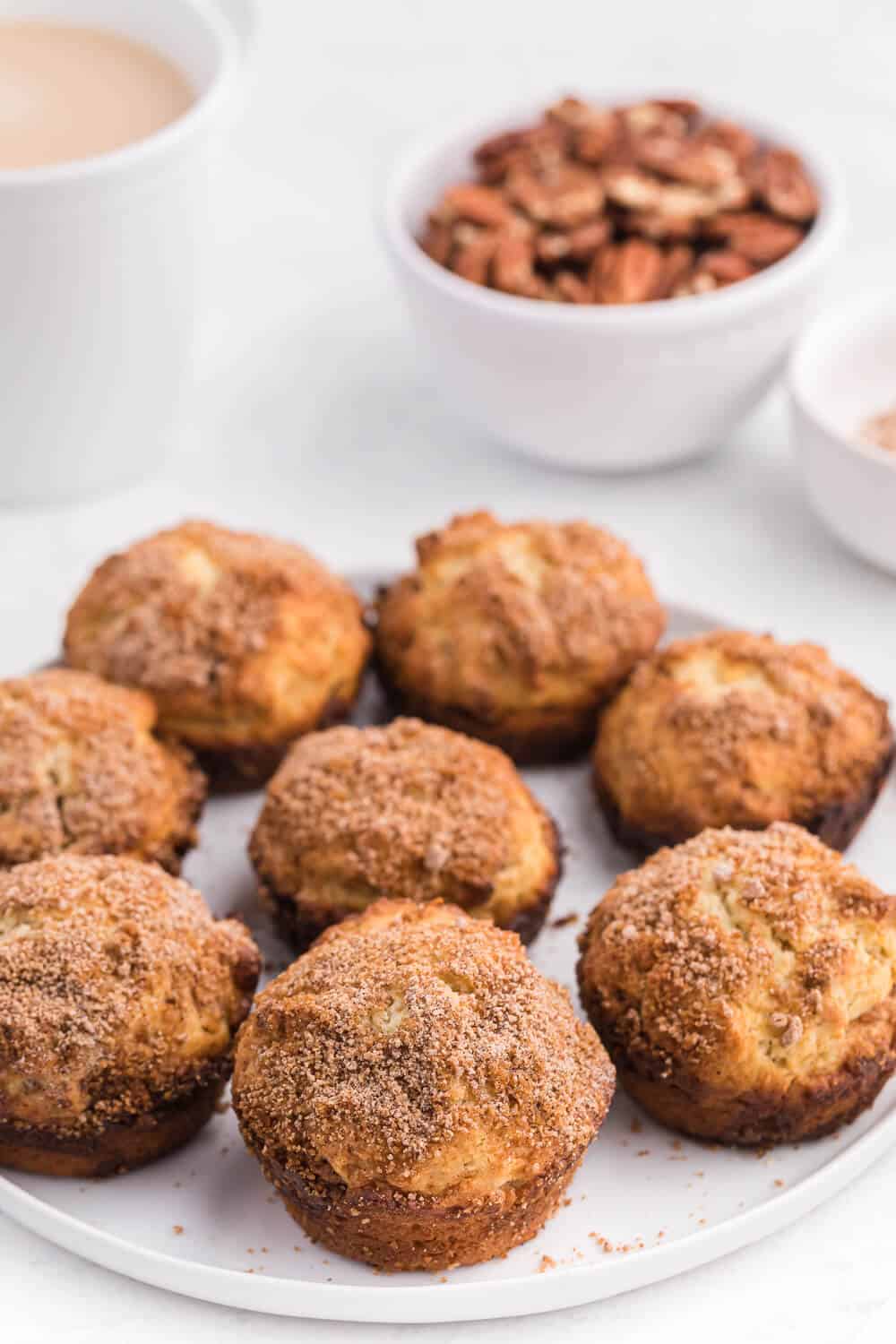 pecan coffee cake muffins on a white plate