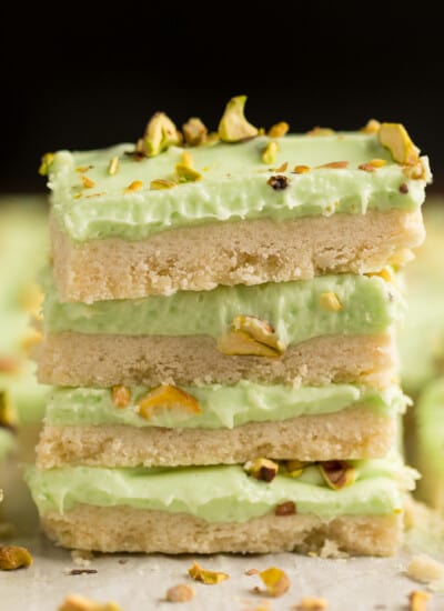 Pistachio Cream Bars - Made with a shortbread cookie base and filling that is a cross between a pudding and cheesecake.