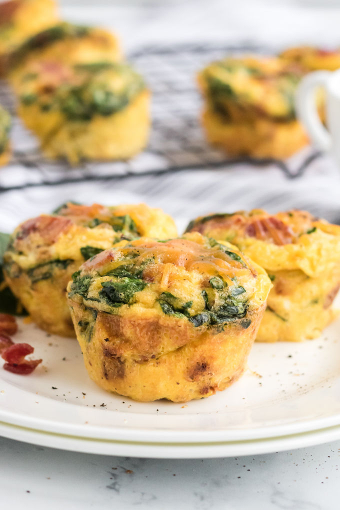 A plate of spinach and cheese egg muffins.
