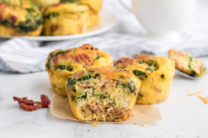 Spinach & Cheese Egg Muffins - a mini frittata made with bacon, onions, cheese and spinach. Always a breakfast fave!