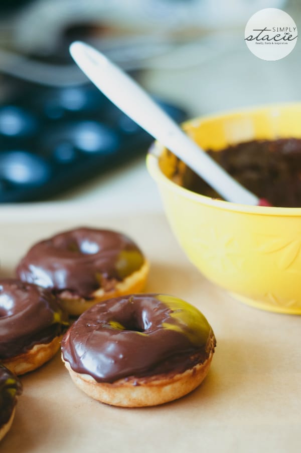 Cake Donuts with Chocolate Glaze - Skip the coffee shop and make some easy homemade cake donuts! These easy treats are baked, not fried, and are topped with a delicious chocolate glaze. 